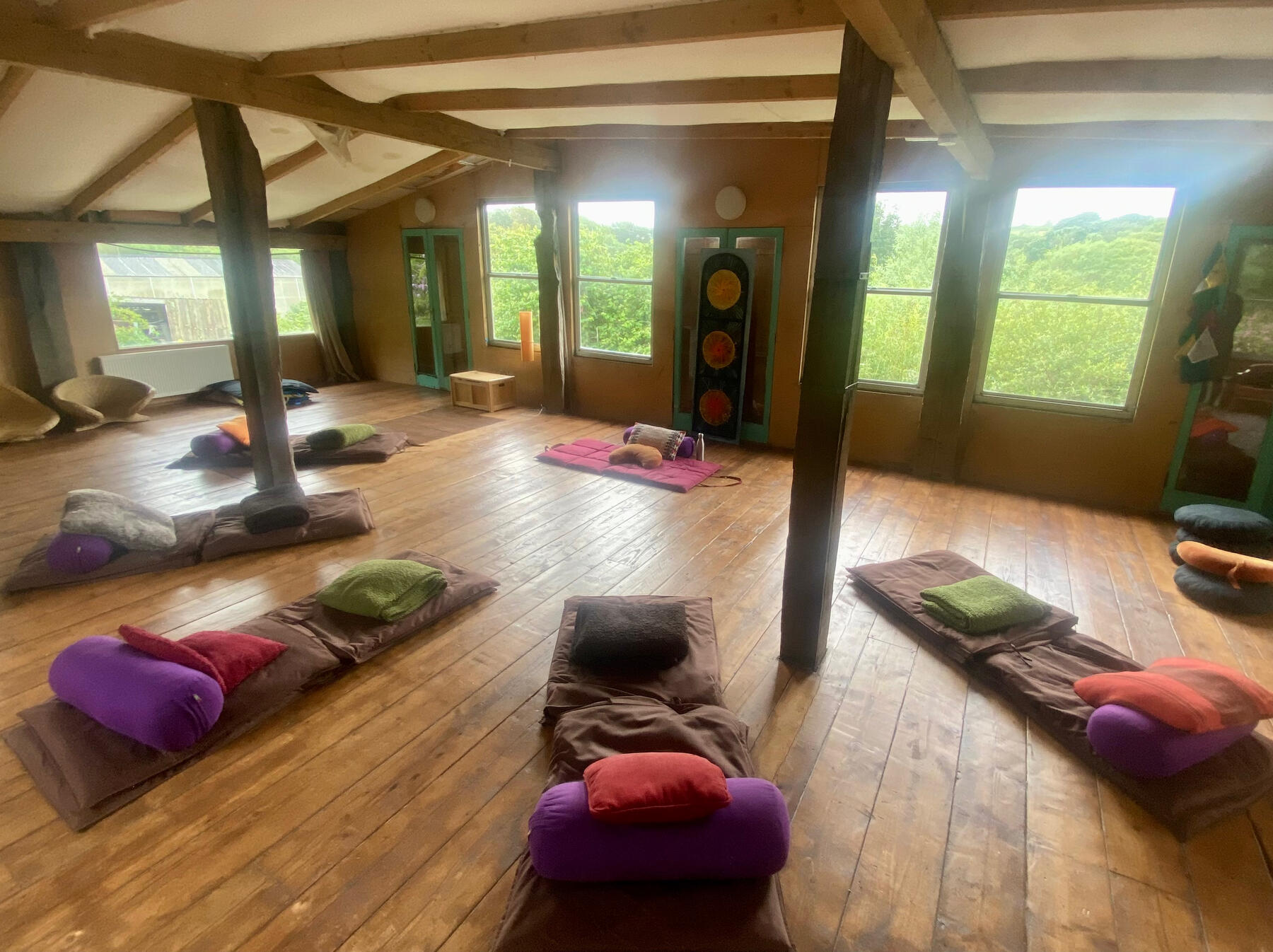 Group TRE space image of room set up for TRE trauma release class cornwall